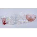 A quantity of glassware, including a pair of salts, a scent bottle, bowls, champagne flutes and
