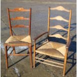 An Arts & Crafts fruitwood ladder back chair with rush envelope seat and a similar rush seat elbow