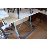 A marble top conservatory table, on green painted wrought iron support, top 22" x 48"