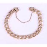 A 14ct gold curb link bracelet with box clasp and safety chain, 36g