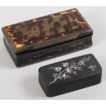 A 19th century papier-mache and tortoise shell snuffbox and a papier-mache snuffbox with inlaid
