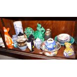 A collection of Chinese and Japanese ceramics, including Satsuma vases, a Dog of Fo, etc