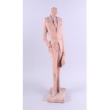 Austin Proo: a terracotta sculpture of a man with a hat, signed to the base, 26" high