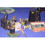 A selection of tin-plate toys and engines, including a Mamod miniature grinding machine, and a box