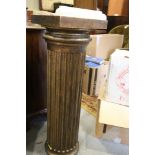 A gilt fluted column on square base, 36" high