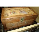 A Chinese carved camphor wood coffer with inset hardstone figure decoration and lift out tray, 39"