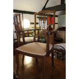 A set of six Edwardian walnut and line inlaid dining chairs with pierced splat backs, on cabriole