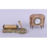 A perpetual calendar and pen holder with onyx base and a marble and gilt metal mounted mantel clock