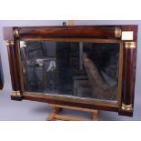 A mid 19th century mahogany overmantel mirror with half columns, plate 13" x 23"