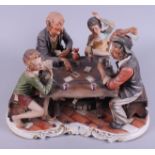 A Capodimonte porcelain group, card players, and another, rearing horses