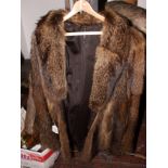 A mid 20th century fox fur coat with leather lining, made by K West