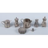 Three silver pepper pots, a silver mustard pot and spoon, a sterling silver box, decorated basket of