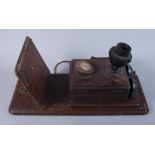 An early wooden framed wall telephone