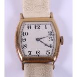 An 18ct gold wristwatch with Arabic numerals, on cream leather strap with rolled gold clasp