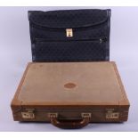 A Bugatti faux shagreen and leather bordered briefcase and a black leather case