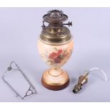 A Royal Worcester blush ivory oil lamp with floral decoration, on later wooden base, 16" high
