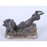Aigon: a silvered model of a rabbit taking cover, 3 3/4" high