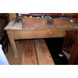 A fruitwood farmhouse table with two drawers, on square supports, 63" wide (damages)