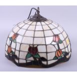 A Tiffany design lamp shade, decorated with flowers