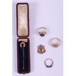 An 18ct gold, ruby and diamond dress ring (one stone missing), two 9ct gold signet rings, a 9ct gold