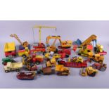 A quantity of die-cast construction vehicles, including a Dinky Michigan Tractor Dozer, a Corgi