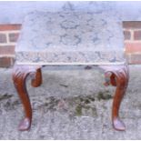 A walnut framed dressing stool, upholstered in a blue brocade, on shell carved cabriole supports,