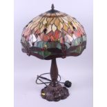 A Tiffany design lamp with shade, the shade decorated with dragonflies