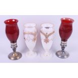 A pair of Victorian glass vases, 9 3/4" high, together with a pair of ruby glass storm lights with
