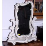 A white and gilt painted Rococo design toilet mirror, 17" wide overall