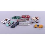 A quantity of die-cast Dinky Toys racing cars, including M G Midget, Sunbeam, Alpine, Bristol 450,
