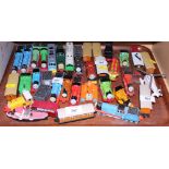 A collection of "Thomas & Friends" locomotives, carriages, wagons, etc