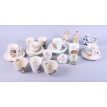 A quantity of ceramics, including commemorative mugs, cottage ware, Wedgwood, a Japanese eggshell