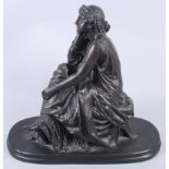 A resin figure of a classical maiden, indistinctly signed to base, 12 1/2" high