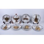 A set of eight Fornasetti Stovigiae "Gilt Vase" pattern plates, 8 1/4" dia (slight rubbing to