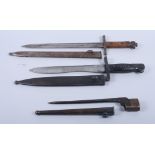 An early 20th century bayonet with metal scabbard, 11 3/4" long and a nail bayonet and a later