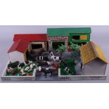 A model farmyard and a collection of farm animals, various