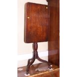 A late 19th century / early 20th century mahogany rectangular tilt top table, on tripod supports,