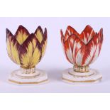 Two 18th century Derby "Tulip" pattern egg cups, on octagonal bases (restorations 2 1/4" high