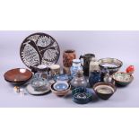 An assortment of studio pottery, including two models of birds, vases, plates, jugs and other items