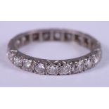 A diamond and white metal mounted full eternity ring, ring size L/M