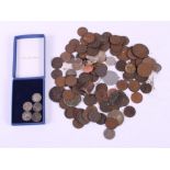 Four silver threepence coins and a collection of other pre-decimal coins