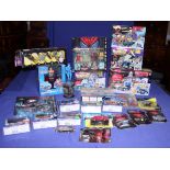 A Kenner Batman and Robin Batcave Micro Playset, a Microverse Gotham City Micro Playset, a DC die-
