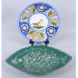 A faience plate with cockerel decoration and a collection of studio pottery mugs, vases, jars and