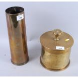 A WWI brass 6" mortar shell case box and an 8lb shell case