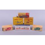 Four Dinky Toys die-cast model vehicles, No 139, No 471, No 472 and No 514, and two Dinky Toys model