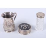 A silver christening mug, a circular silver box with pique decorated lid and a silver mounted cut