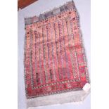 A Middle Eastern rug decorated waves and mutli-borders, 39" x 27" approx