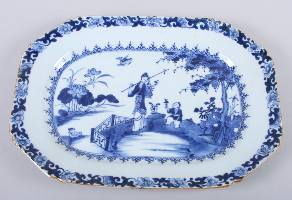 An 18th century Chinese blue and white porcelain octagonal meat dish with figures in a garden