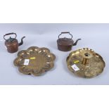 An Arts & Crafts embossed brass candlestick, two salesman's miniature copper kettles and an Indian