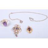 An Edwardian 9ct gold and amethyst pendant, on chain, a 9ct gold and amethyst single stone ring,